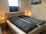 Ferienhaus in Fehmarn OT Gammendorf - Feriendomizil SeeSand 2 - Schlafzimmer mit Doppelbett