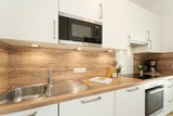 Ferienwohnung in Fehmarn OT Fehmarnsund - Strandresidenz Vogelflug Sundblick - Bild 2